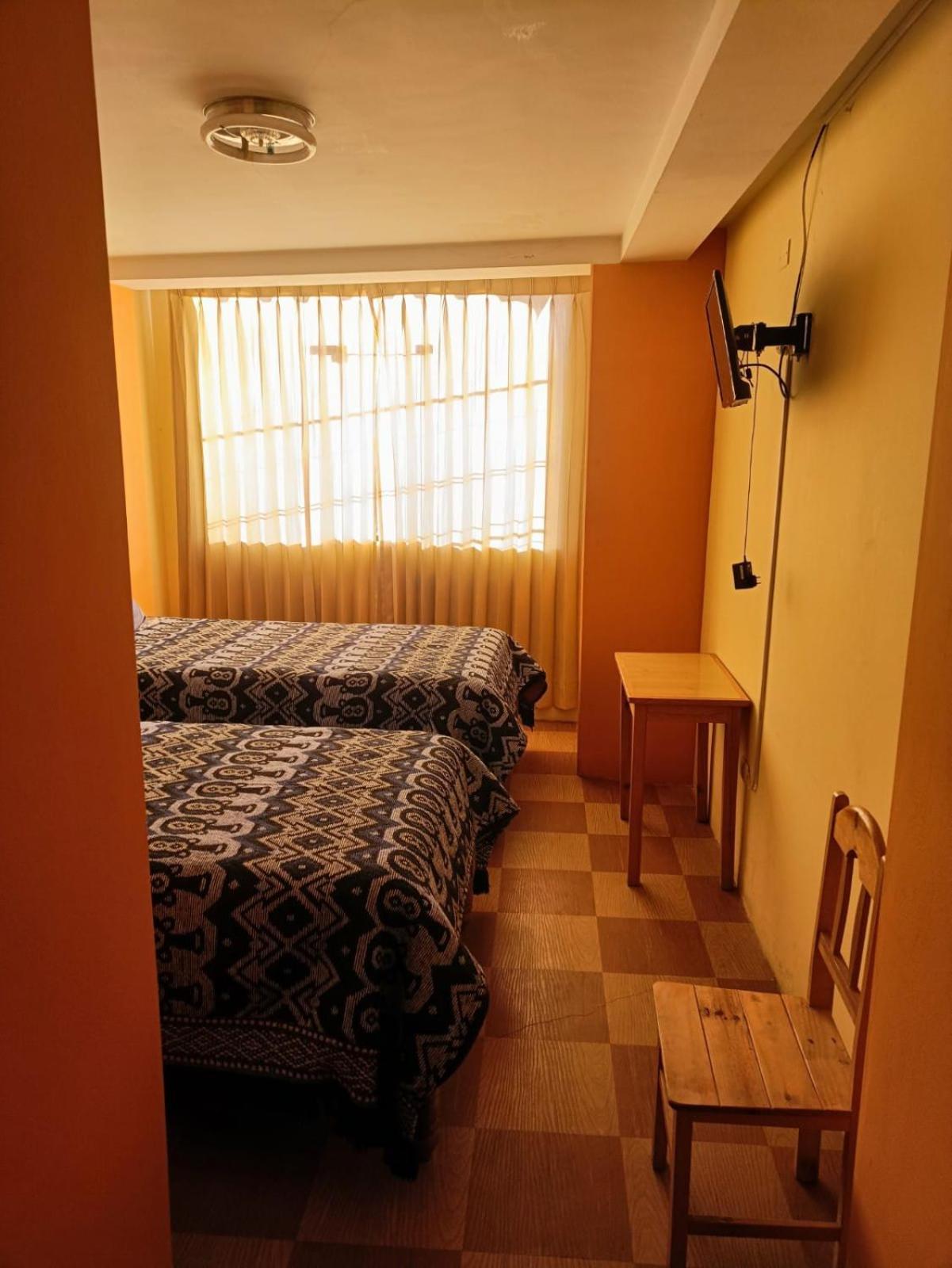 Hostal Vista Al Lago Titicaca Пуно Екстериор снимка