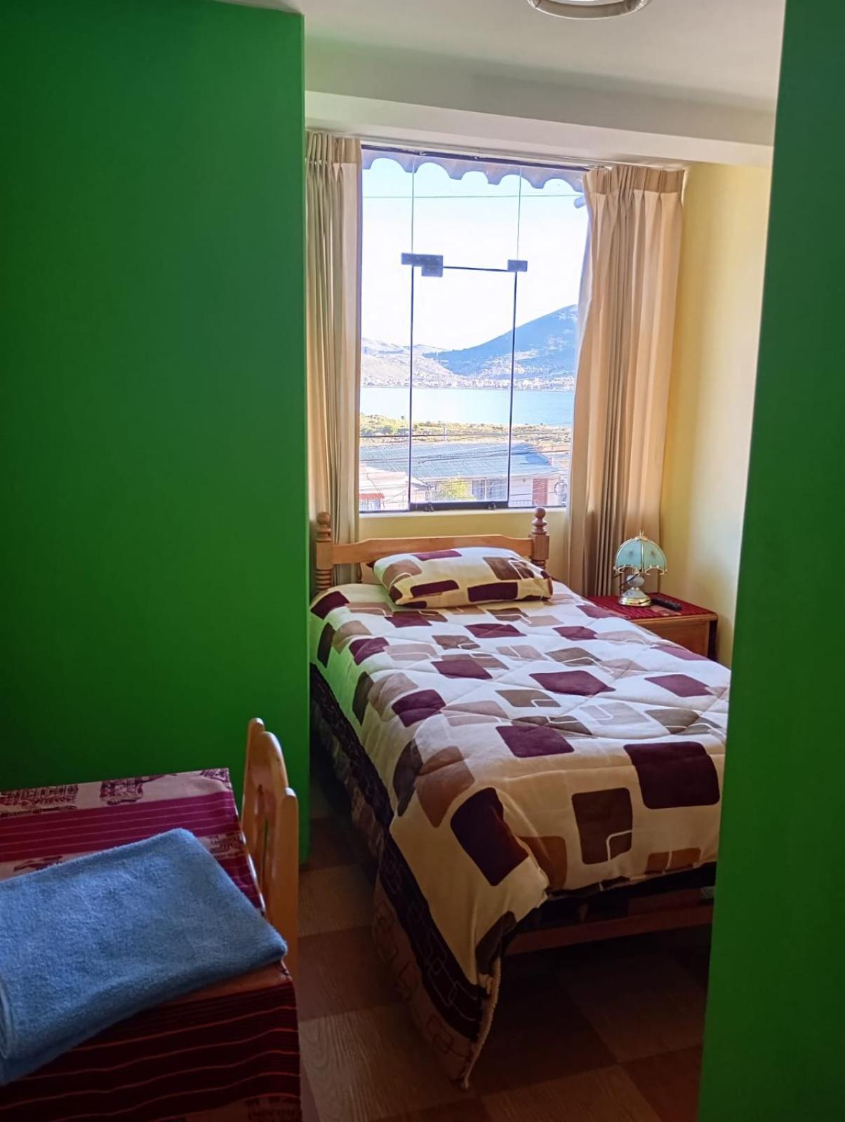 Hostal Vista Al Lago Titicaca Пуно Екстериор снимка